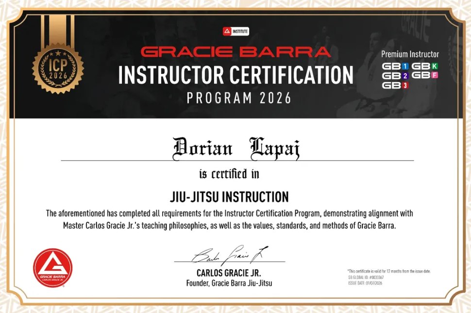 Dorian Lapaj's official Gracie Barra Instructor Certification Program 2026 certificate, signed by Carlos Gracie Jr., certifying him in Jiu-Jitsu Instruction